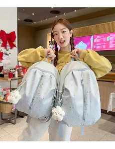Korean style sweet star print backpack for girls, cute casual school bag with plush charm.