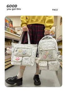 Detailed shot of cute star print school backpack and tote bag set in sweet style for students.