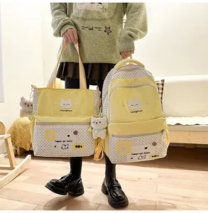 Set zaino scolastico e borsa a pois per studenti, simpatico design di gatto con ciondolo.