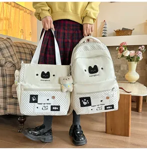 Set di zaino e borsa a mano in stile dolce per studenti, grazioso motivo a pois bianchi.