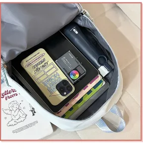 Casual canvas school backpack with large capacity inner storage for daily travel and school.