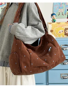 Vintage corduroy shoulder bag with polka dots, large capacity casual crossbody bag for daily use.