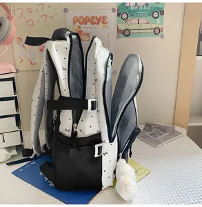 Cute black and white polka dot backpack detail, sweet style large capacity bag with plush toy.