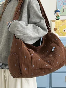 Retro brown corduroy shoulder bag with blue polka dots, large capacity casual crossbody tote bag.