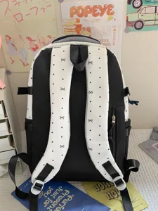 Ins style cute black and white casual dual-shoulder backpack with bow and polka dots.
