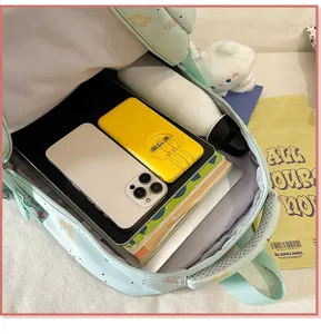 Casual cute canvas school backpack large capacity travel daypack for student daily commute.