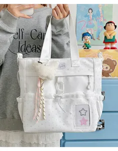 Japanese star canvas tote bag, lightweight student messenger bag with cute plush pendant.
