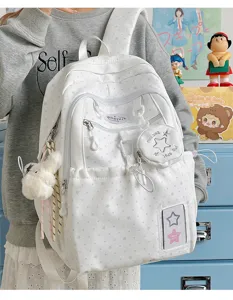 White star pattern backpack student casual school bag with cute charms and front pocket design.