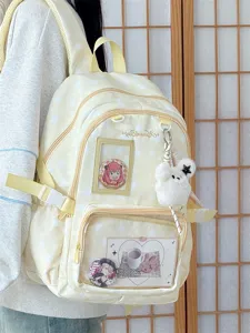 Close-up detail shot of the sweet Japanese candy color star ita backpack featuring anime badges.