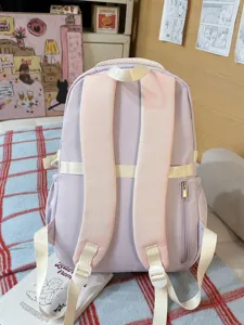 Cute pastel purple backpack for women, stylish school bag with comfortable pink straps.