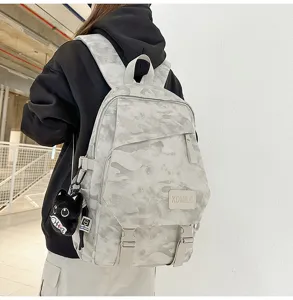 Lightweight camouflage canvas backpack with cute cat plush pendant for daily casual travel.