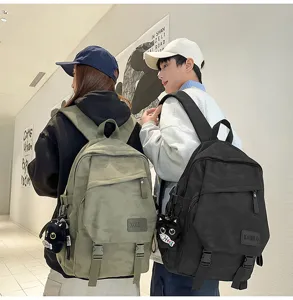 Casual couple camouflage backpack with cute cat pendant, lightweight daily travel daypack.