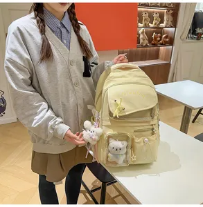 Zaino da studente in stile giapponese con ciondolo in peluche, grande capacità per la scuola.