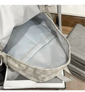 Lightweight multi-purpose gray camouflage tactical casual backpack with spacious interior.
