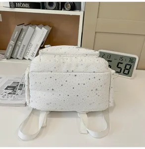 White star pattern backpack detail view, casual school bag for daily use and travel.
