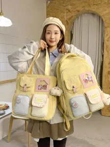 Cute aesthetic yellow canvas backpack and tote bag set for school students daily use.