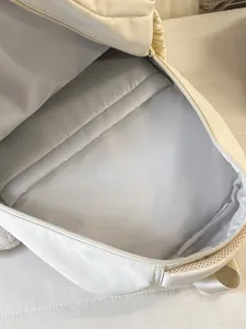 Casual school backpack for girls, stylish campus bookbag with spacious interior design.