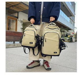 Casual minimalist beige waterproof canvas backpack set for daily commute, outdoor travel and school.