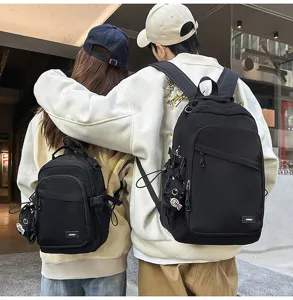 Minimalist black couple backpacks detail, featuring mini and large sizes for daily commute.