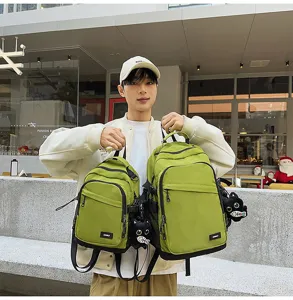 Lightweight green backpack and sling bag set for outdoor hiking and daily commute.