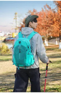 Outdoor backpack for hiking and travel, durable waterproof lightweight daypack for men.