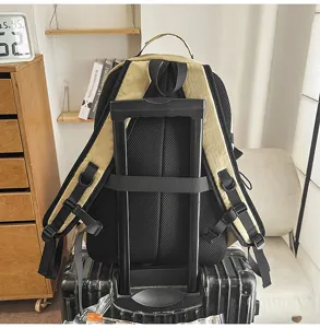 Casual outdoor travel backpack with luggage strap and breathable mesh back padding design.