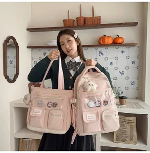 Korean style pink backpack and tote bag set for students, featuring clear front pocket design.