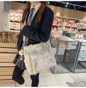 Detailed view of Japanese style canvas tote bag with star print, student shoulder bag.