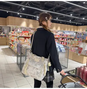 Japanese style canvas tote shoulder bag with star pattern, multi-pocket design and cute plush.