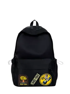 Casual black backpack for students, large capacity stylish school bag with cool patches.