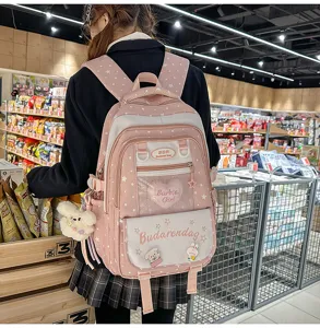 Sweet pink ita backpack with star patterns, cute school style casual daypack for teens.
