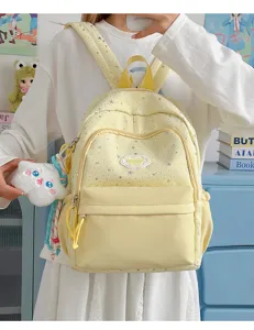 Cute yellow star print school backpack for teens, sweet casual daily daypack with front pocket.