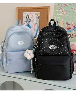 Close-up detail of the cute star pattern school backpack, featuring front pocket and canvas.