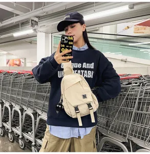 Casual nylon crossbody sling bag for men and women, stylish streetwear chest pack for daily use.
