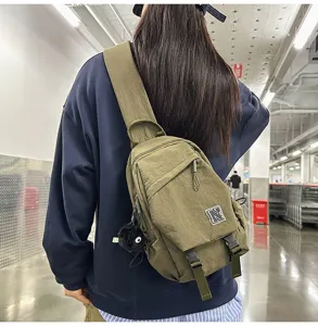 Unisex casual nylon chest bag, stylish olive green crossbody backpack with front pocket and buckle.