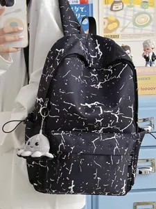 Sac à dos éclaboussures noir et blanc pour femmes, grand sac d'école décontracté avec joli pendentif.