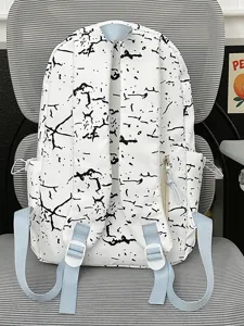 Sac à dos élégant à motif d'encre noir et blanc avec des bretelles bleues pour usage quotidien.