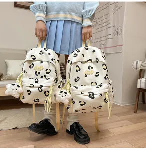 Cute Korean style leopard print canvas backpack detail, lightweight daily school bag view.