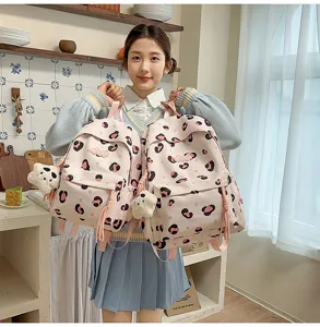 Cute pink leopard print school backpack detail showing sweet style and daily casual wear design.