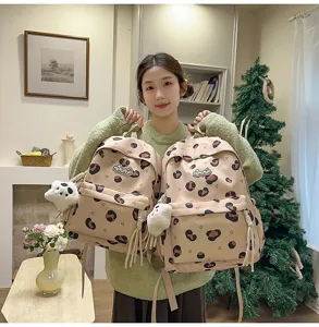 Sweet style cute polka dot school bag detail, lightweight daily travel backpack for women.