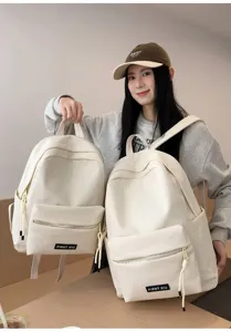 Sac à dos d'école uni style coréen pour femmes, sac de voyage décontracté élégant.