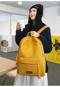 Sac a dos scolaire minimaliste de couleur unie pour etudiants, sac de voyage leger et chic.