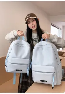 Sac à dos étudiant unicolore style coréen, sac d'école de voyage léger avec poche avant.