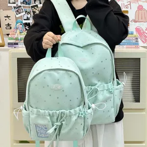Mint green school backpack set for students, cute star pattern with drawstring pocket.
