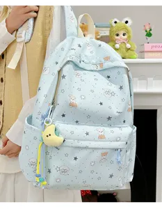Cute Japanese style blue canvas backpack for school girls, large capacity casual daypack.
