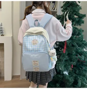 Japanese sweet plaid backpack for students, lightweight school bag with cute bear pendant.