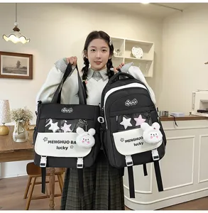 Cute black and white student schoolbag set with transparent pocket and cute rabbit pendant.