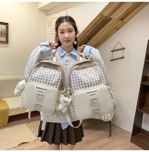 Japanese style sweet plaid backpack with large capacity for students and daily casual use.