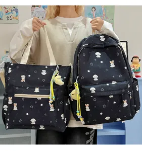 Japanese style canvas backpack and tote bag set with cute cartoon dog print and stars.