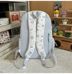 Cute cartoon cat backpack for women, large capacity student school bag with sweet graffiti style.